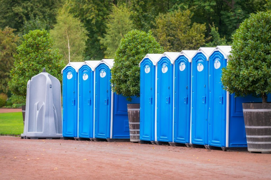 portable festival toilets in swedish park.